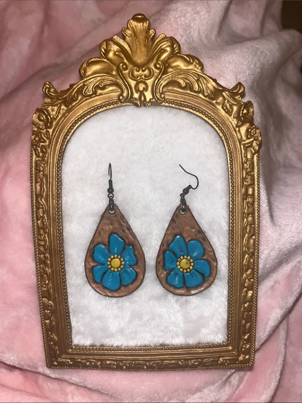 Handcrafted Teardrop Leather Earrings with Blue Flower Accent